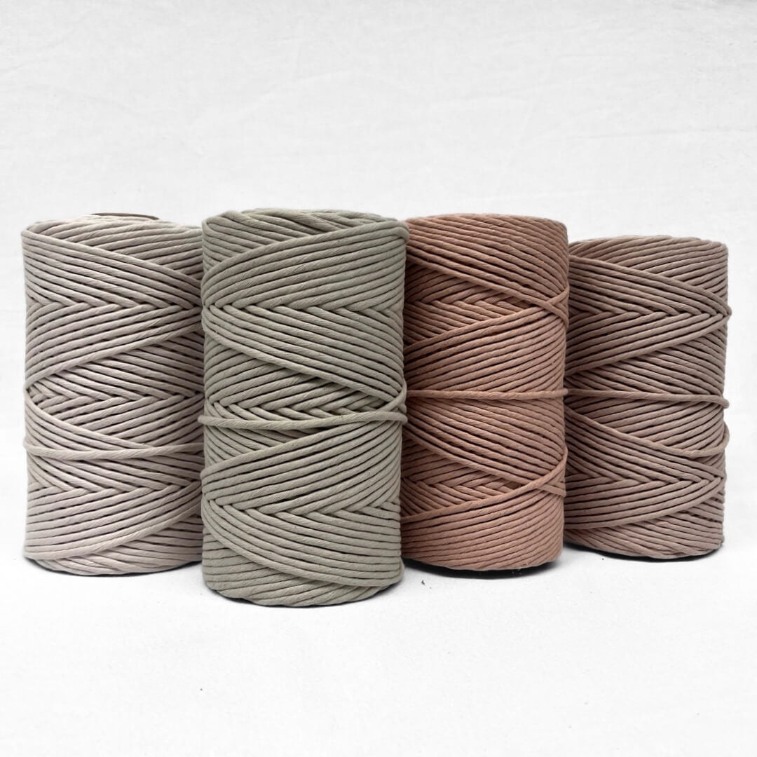 muted cool toned latte brown 3mm and 5mm cotton string on white background