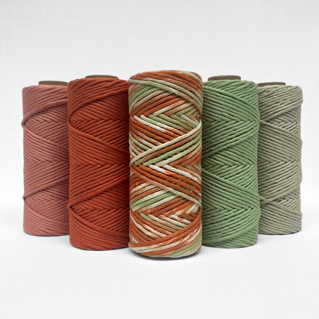 combination nation image showing banksia hand painted string with four matching solid colours in clay red sand meadow green and pistachio